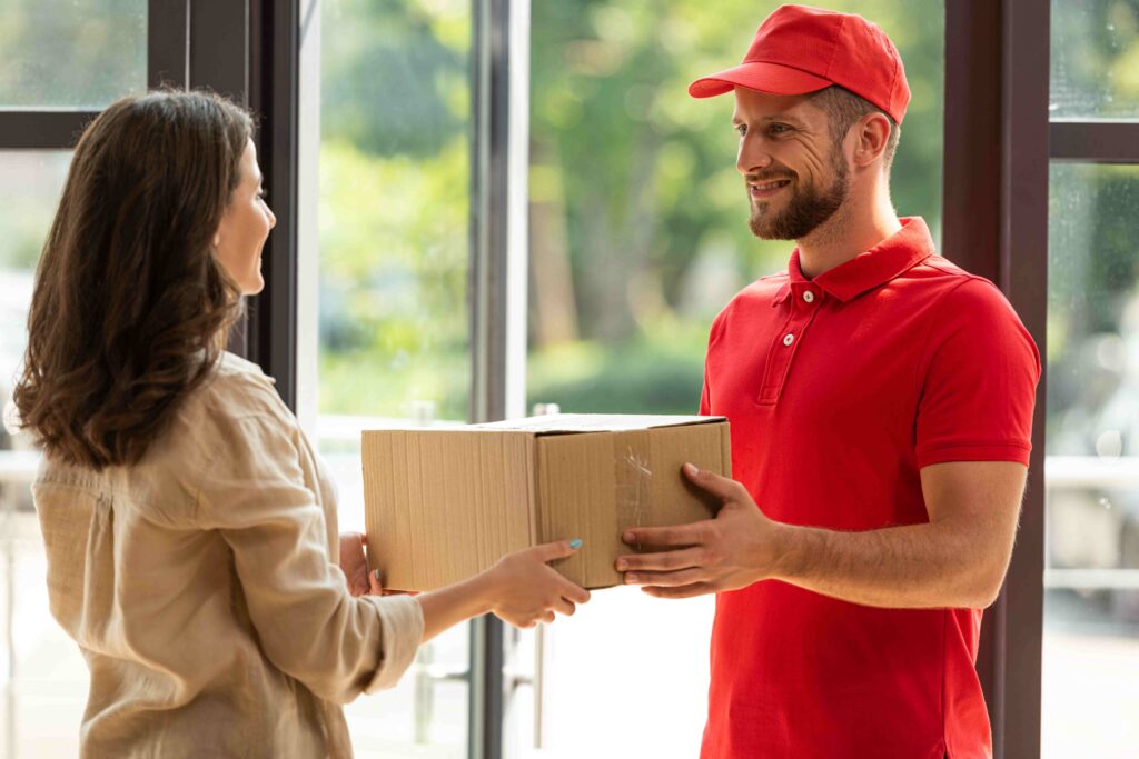 happy woman receiving carton